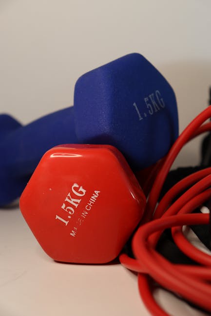 Red and blue 1.5kg dumbbells with training rope